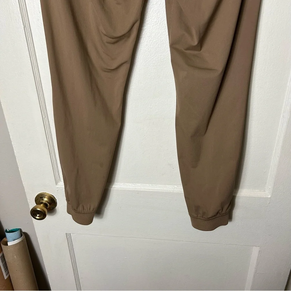 Rhone tan commuter performance joggers men's S pull on drawstring